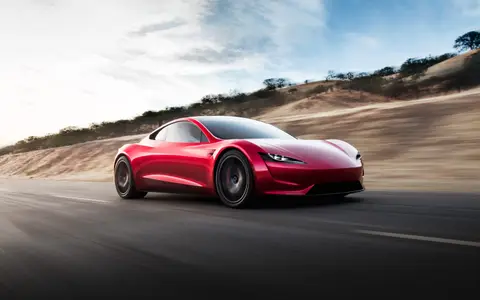 Red next-generation Tesla Roadster prototype on a desert road (Tesla photo)