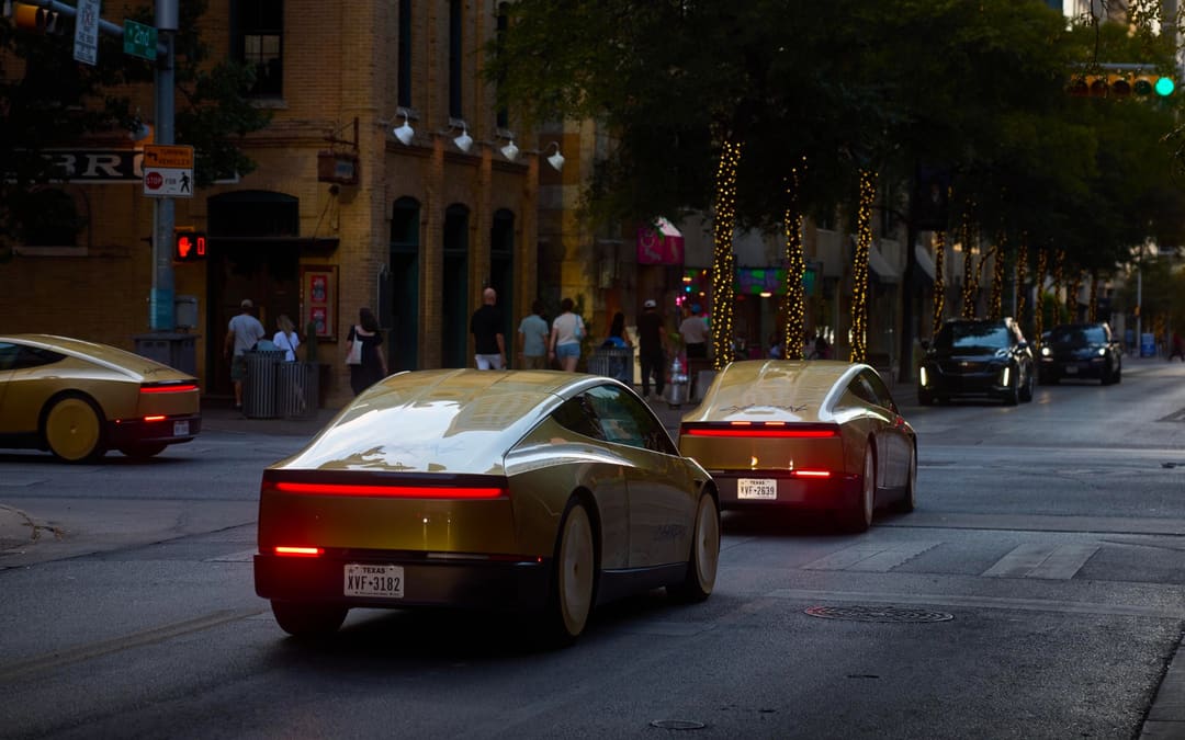 Cybercabs driving on an Austin street (Cybercab Austin launch, Q3 2026 update)