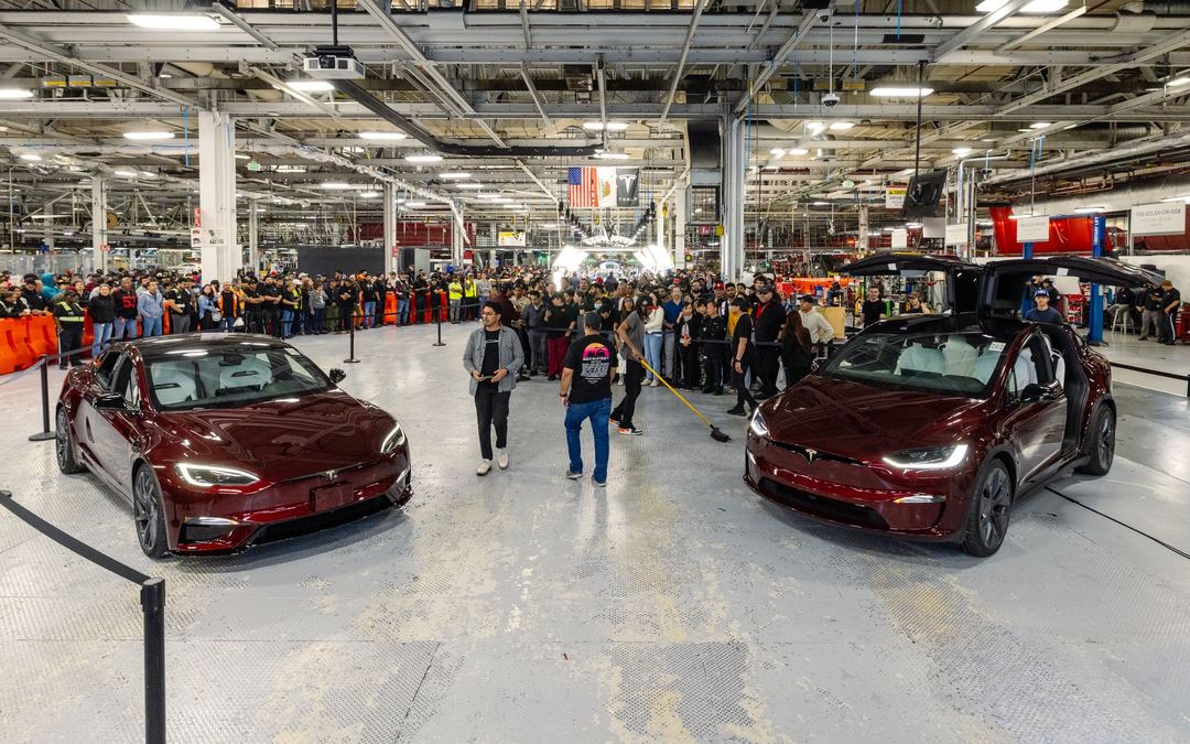 Fremont team posing with one of the last cars built