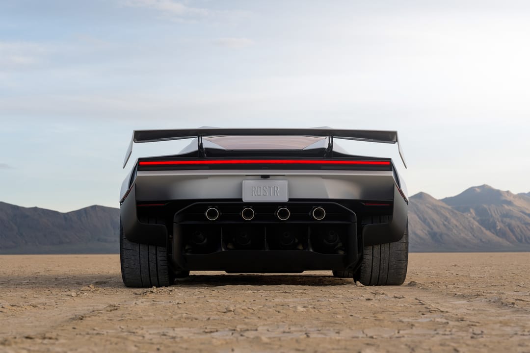 Tesla Roadster. Desert day, rear view